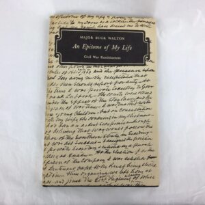 A book cover with an old handwriting on it.