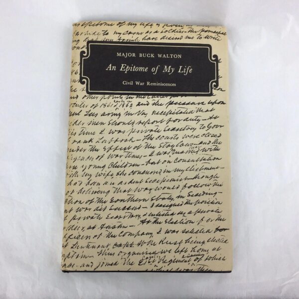 A book cover with an old handwriting on it.