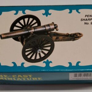 A box with a cannon on top of it.