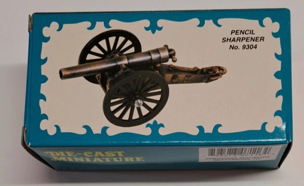 A box with a cannon on top of it.