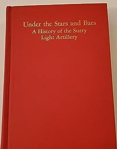 A red book with gold lettering on the cover.