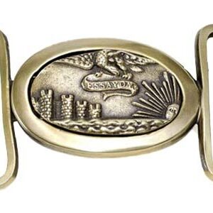 A belt buckle with the image of a city and a bird.